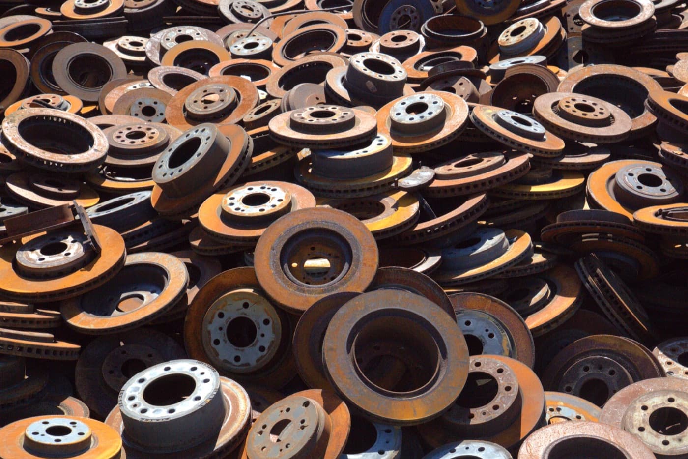 A mountain of scrap brake rotors ready for processing